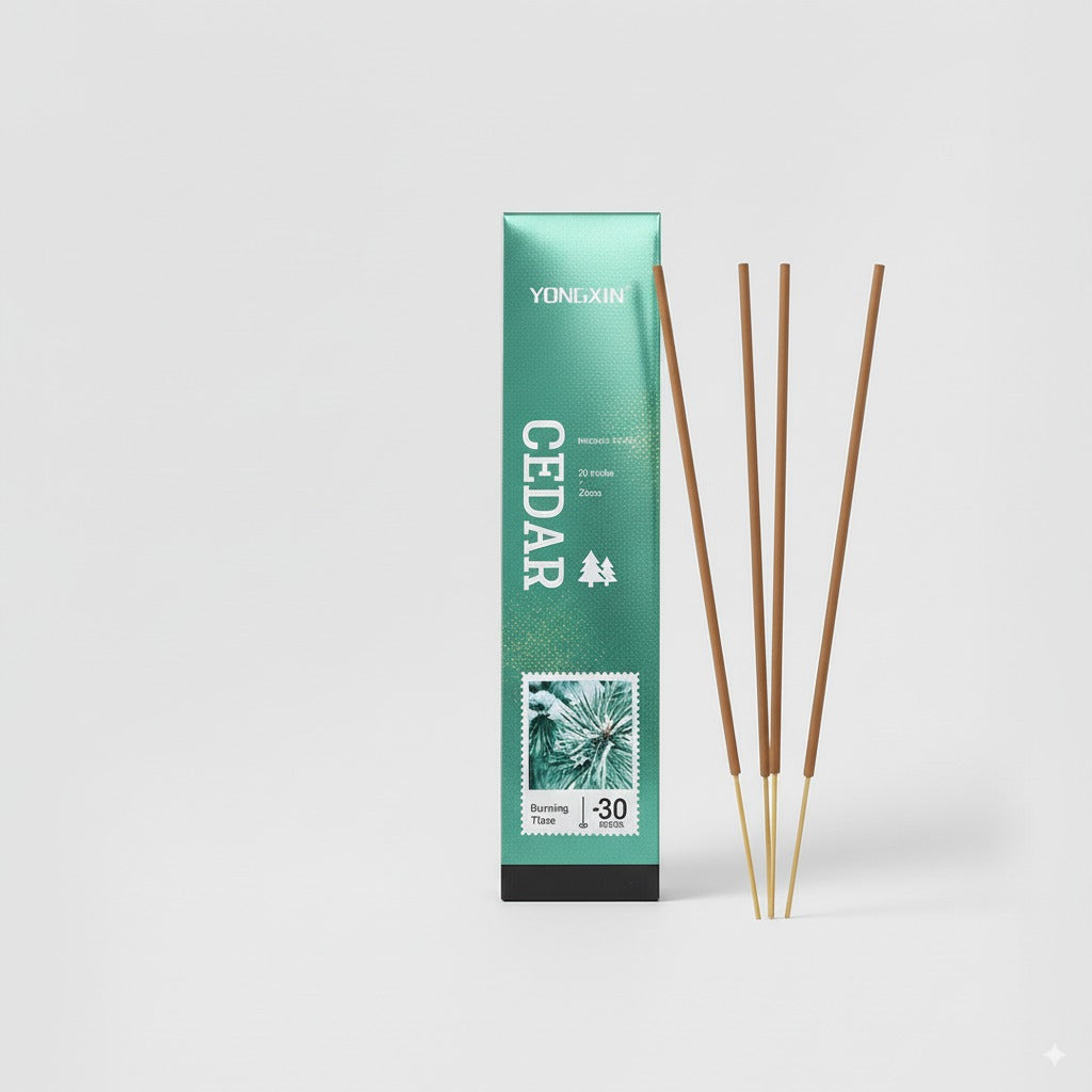 Cedar incense packaging with three incense sticks on a white background
