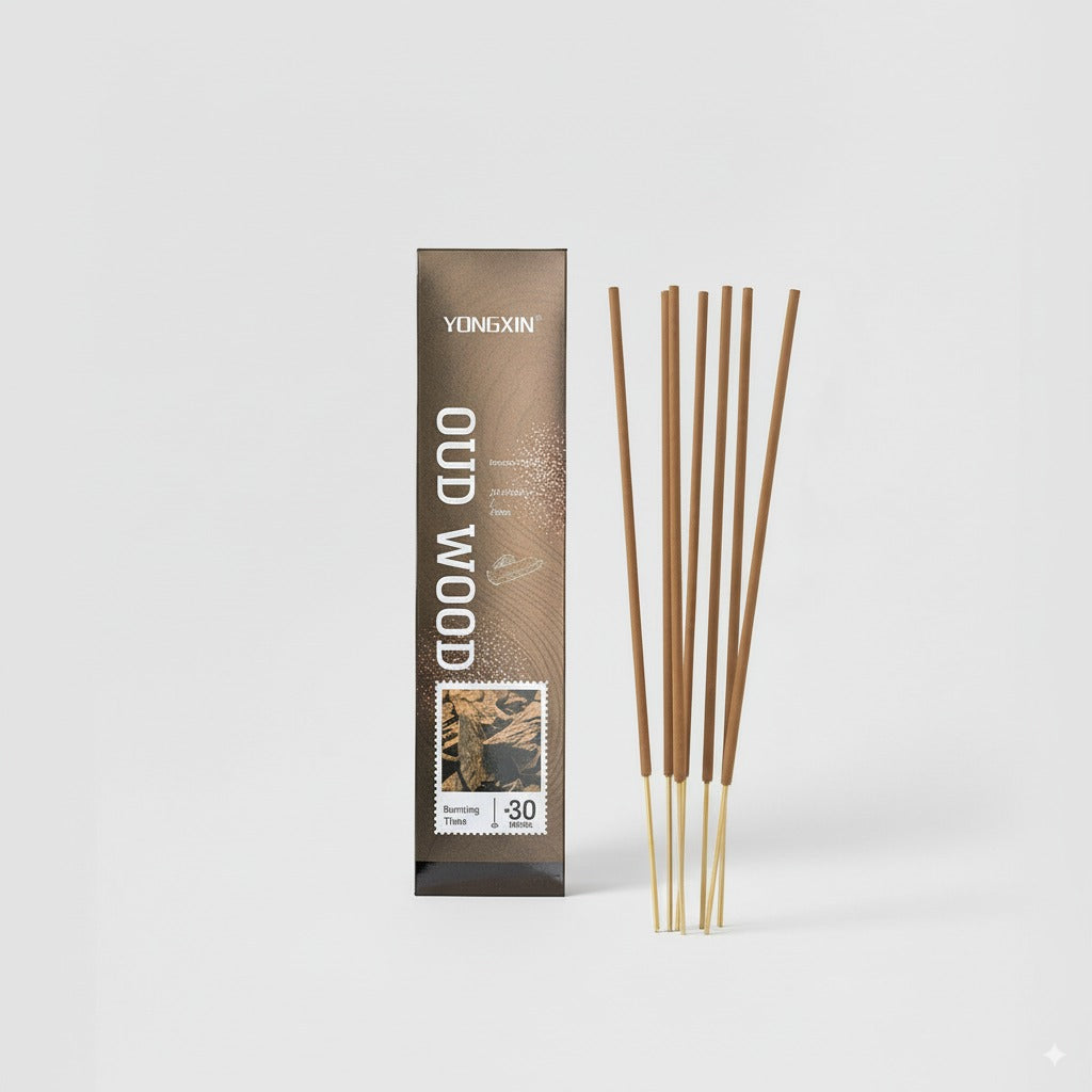 oud wood incense sticks with packaging on a white background